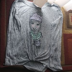 A long sleeve shirt that's Gray has purple and blu